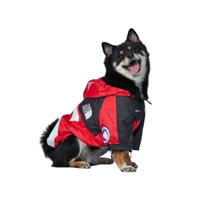 Shiba Inu wearing red Pupreme x TDF windbreaker with S logo on back