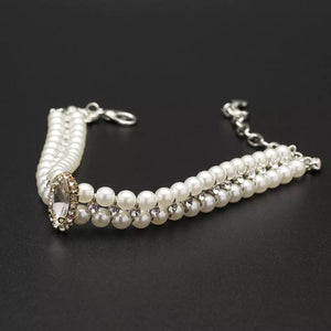 Faux pearl necklace for dogs flat lay showing double strand construction and crystal details