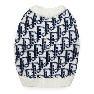 Navy blue Dior style dog sweater flat lay showing ribbed collar and short sleeves