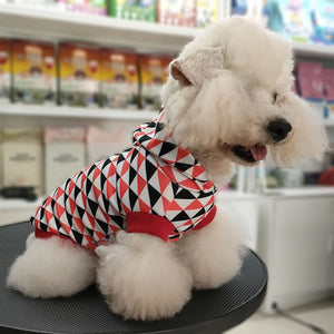 Pawda Triangle Print Hoodie on a dog