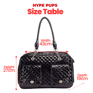 Black quilted luxury dog travel carrier with turnlock closures and chain straps