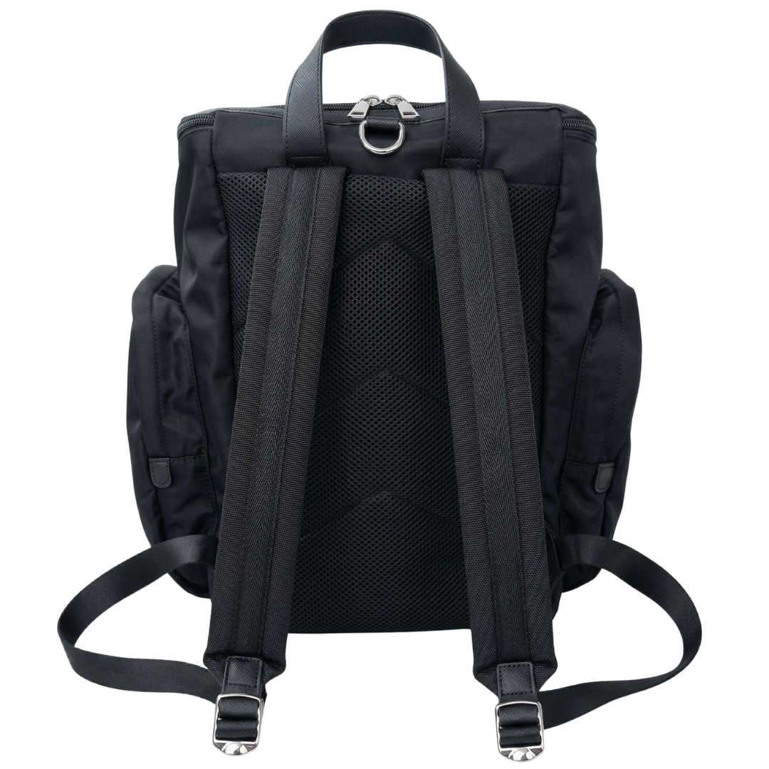 Back view of black dog carrier backpack showing padded straps and mesh panels