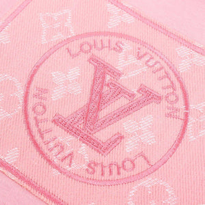 Close-up of embroidered V monogram circular patch with Louis Vuitton inspired design