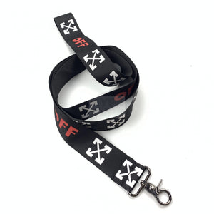 Close up of black dog leash with white arrow pattern and red OFF branding Off-White style