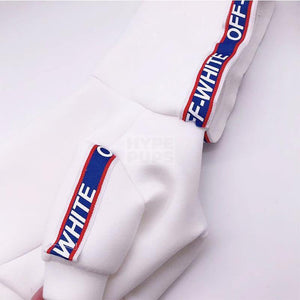 Close up blue red striped tape trim detail on white dog hoodie Off-White inspired