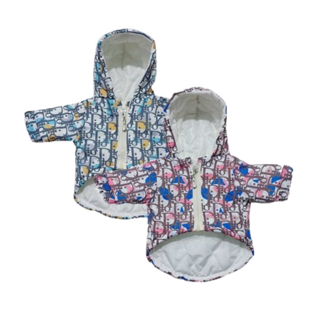 Blue and pink Dogior oblique print dog jackets with hoods flat lay