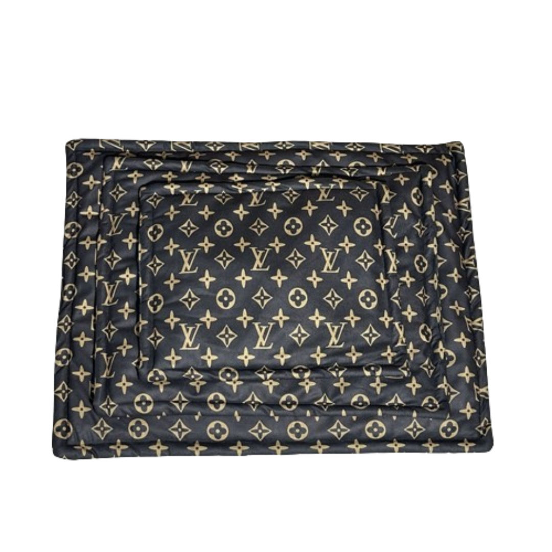 Designer dog travel carrier with V monogram pattern and structured handles