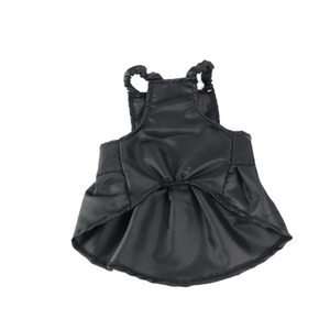 Back view of black pleated dog dress showing bow closure and gathered skirt detail