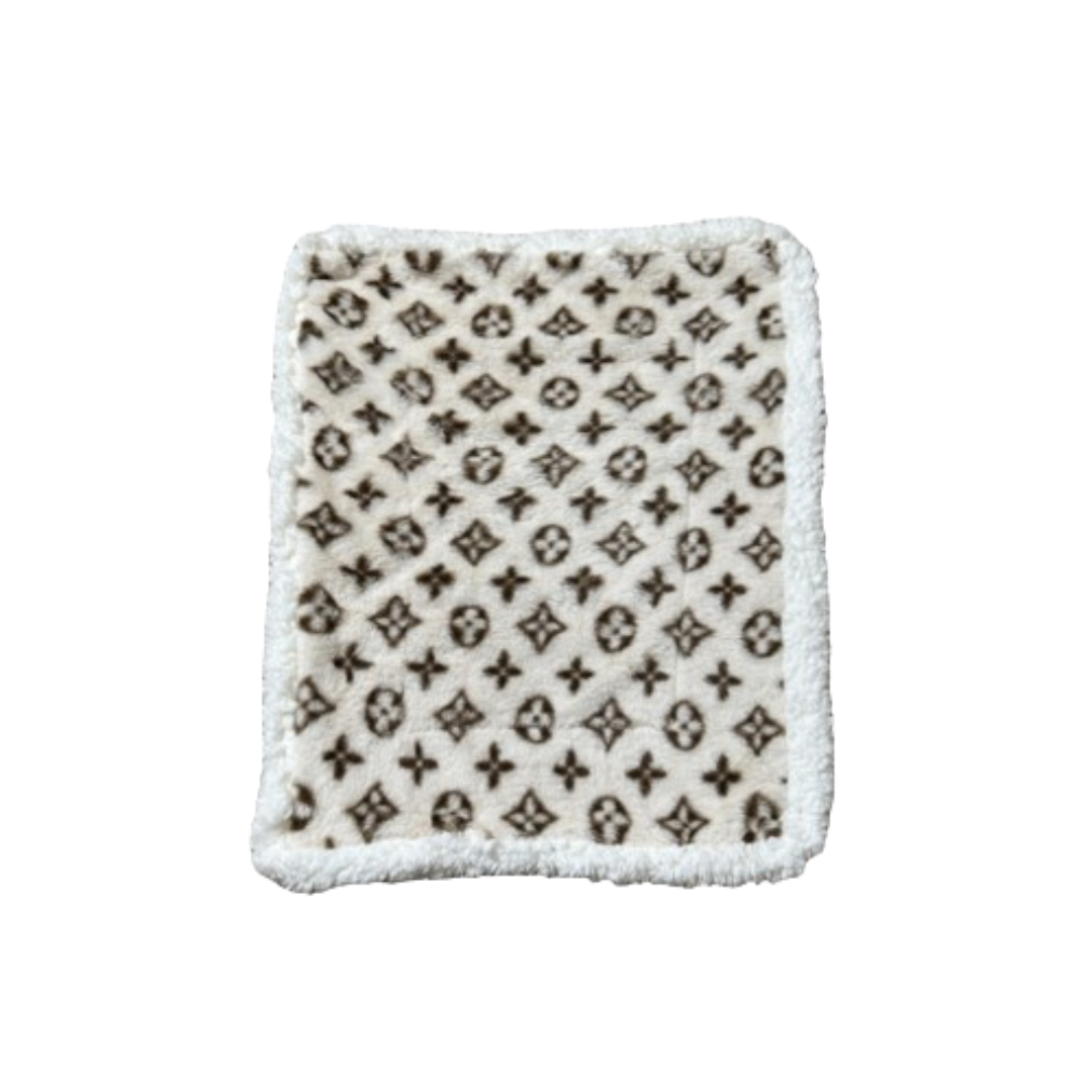 Beige monogram dog bed Louis Vuitton style with brown logo pattern and white fluffy border