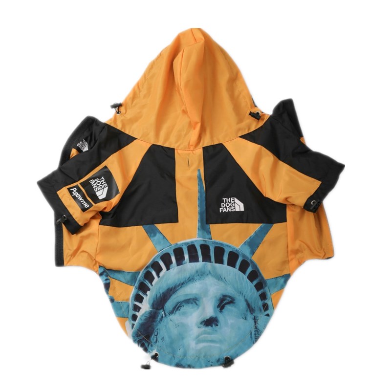 Orange and black Supreme North Face style dog jacket with Statue of Liberty design