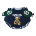 Navy varsity dog jacket with green sleeves and Burberry teddy bear graphic