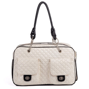 White quilted dog carrier with braided chain handles and front pockets Chanel style
