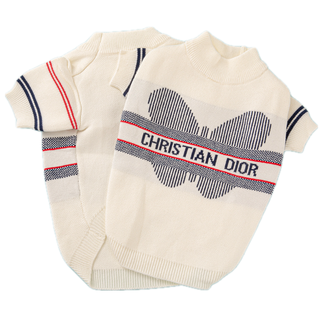 Cream wing motif dog sweater flat lay showing Dior inspired papillon design