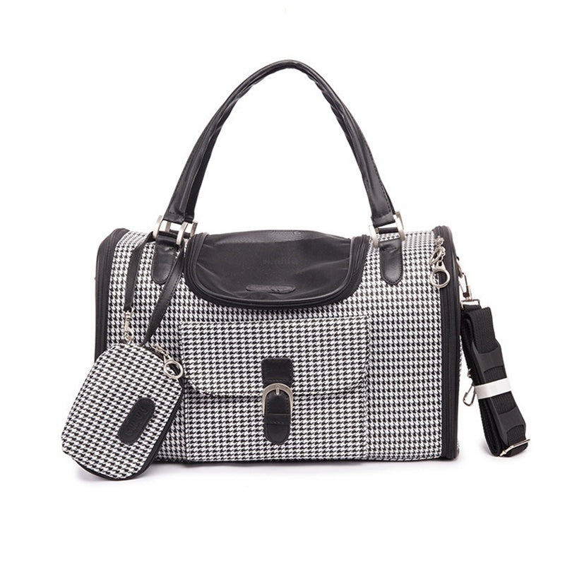 White crocodile pattern dog carrier with dual carrying handles and shoulder strap
