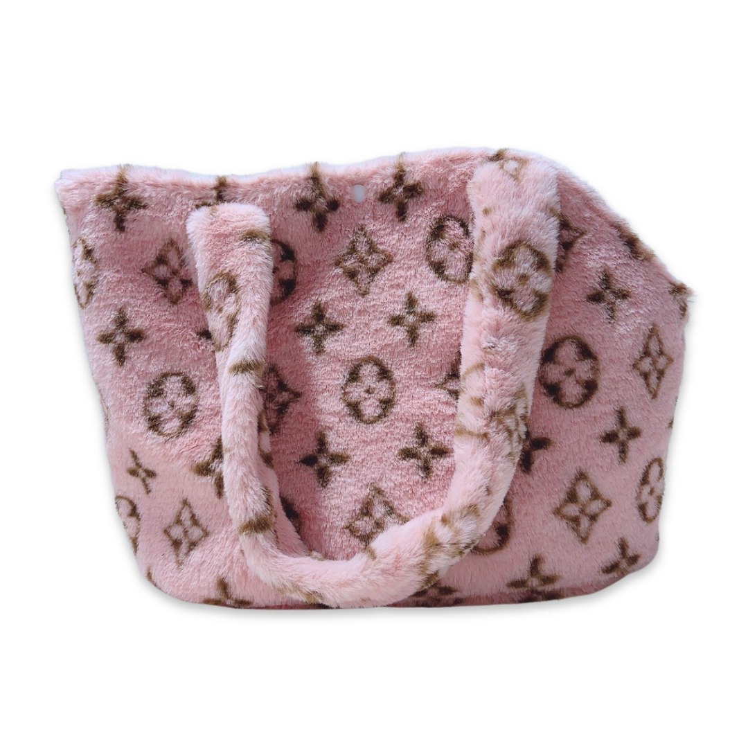 Pink monogram plush dog carrier with V pattern and padded tote handles