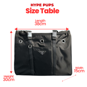 Black nylon pet carrier with triangle branding and airline-style construction