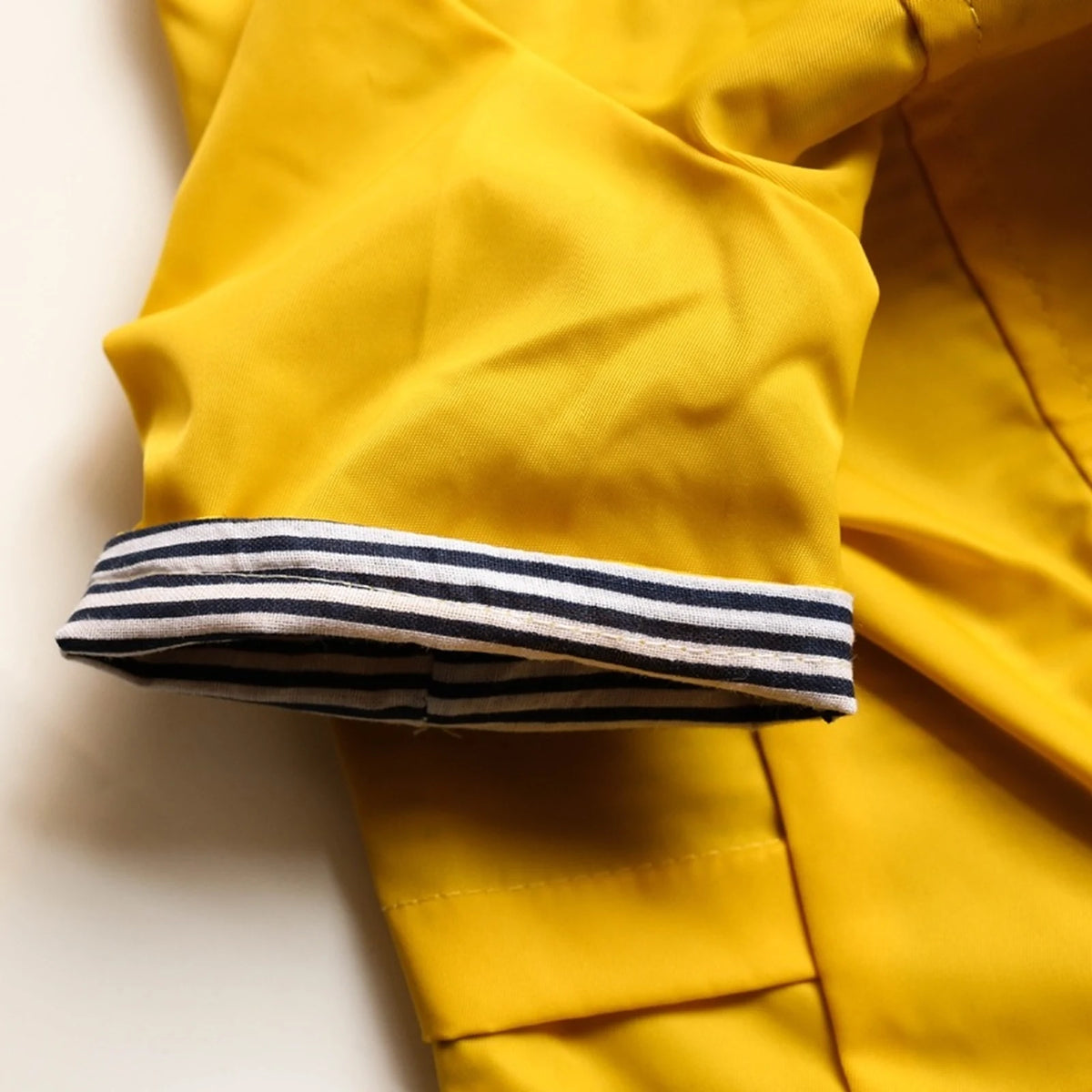 Yellow Hooded Raincoat detail
