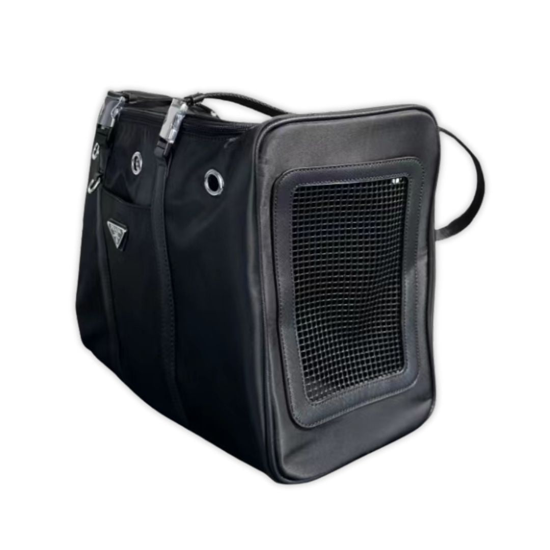 Side angle of luxury dog carrier with mesh ventilation and structured design for airline travel