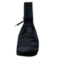 Black nylon dog sling carrier Prada style with triangle logo badge and adjustable strap