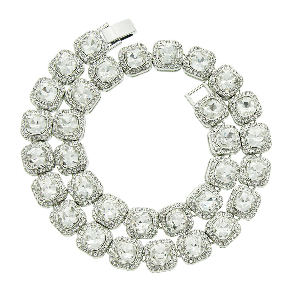Silver clustered tennis necklace with CZ stones showing quick-release clasp