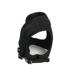 Black dog harness interior view showing padded chest area and secure buckle system