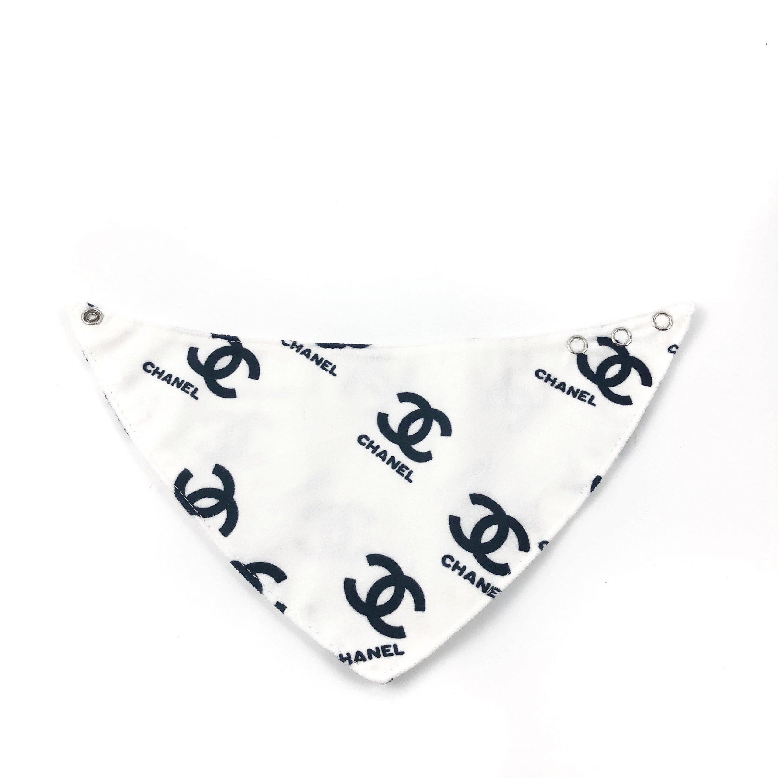 White triangle dog bandana with navy interlocking logo print Chanel style