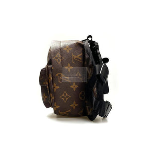 Brown monogram dog backpack back view showing padded panel and strap system