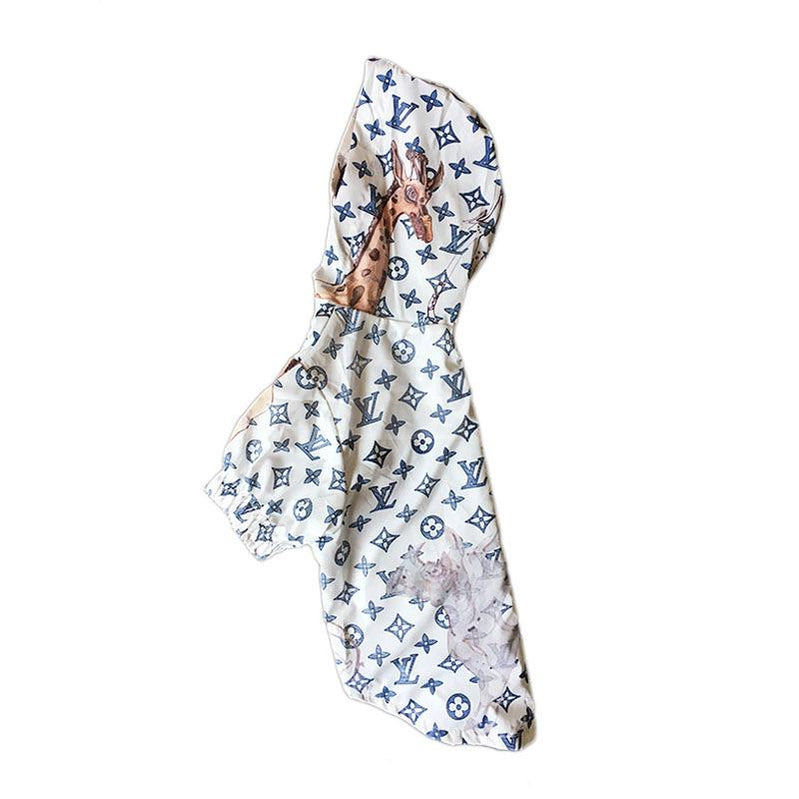 White waterproof dog jacket LV inspired with jungle graphics side view on white background