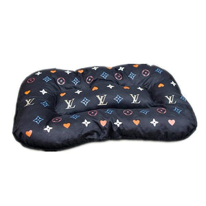 Black dog bed with Louis Vuitton inspired monogram print and colorful hearts stars motifs