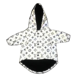 White reflective dog windbreaker with V monogram print on white background front view