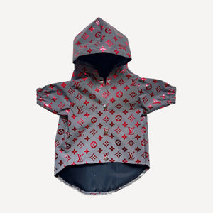 Red reflective dog windbreaker inspired by Louis Vuitton