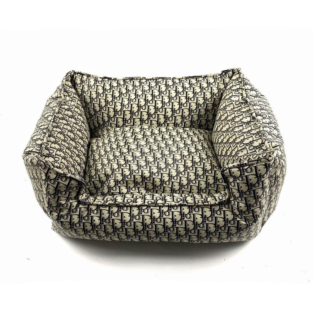 Beige and navy monogram dog bed with Dior oblique pattern and plush walls