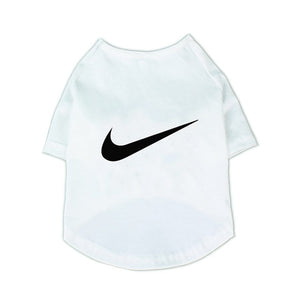 White dog tee with black Nike swoosh logo inspired design on chest