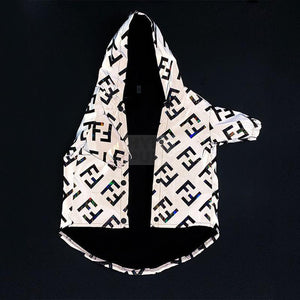 Close-up of reflective FF monogram pattern on gray windbreaker fabric