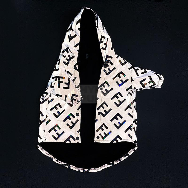 Close-up of reflective FF monogram pattern on gray windbreaker fabric