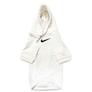White dog hoodie with black Nike swoosh logo sporty design
